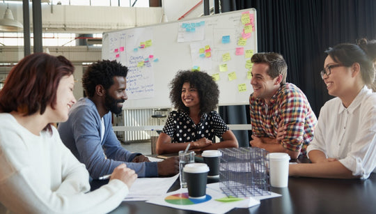 Image of team working in Collaboration in a meeting